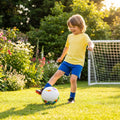 Lightweight garden football with traditional white design and colourful patterns