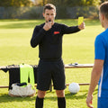 Football referee kit with fluro yellow or black shirt, shorts, and socks