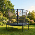 Garden trampoline with enclosure net, ideal for outdoor fun