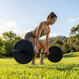 Black Olympic bumper plates made from Virgin rubber