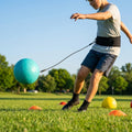 Football kick trainer with adjustable neoprene belt and training ball