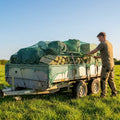 Ultra heavy duty trailer nets for secure cargo transport