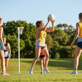 Vibrant netball bibs made of polyester mesh for schools and clubs