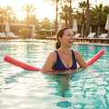 Swimming pool noodles in vibrant colours made from EVA foam