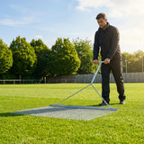 Steel drag mat on a sports field, showcasing its robust design for field maintenance