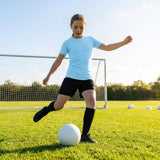Junior girls' base layer top in various colours for sports and training