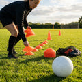 Set of vibrant football training cones in various sizes and colours