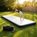 Inflatable gymnastics mat available in various sizes, made from durable PVC
