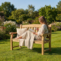 Wooden garden bench with natural finish, suitable for outdoor use