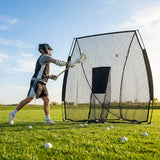Baseball backstop net in use during outdoor practice