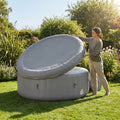 Inflatable hot tub lid in grey and white, energy efficient