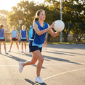 Reversible netball bibs in various colours and sizes, perfect for sports clubs