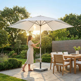 Double-sided garden parasol providing outdoor shade with steel frame