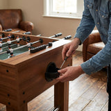 Table football spare parts, including legs and rods