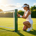 Professional tennis net and posts setup in green