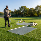 Steel drag mat on a sports field, showcasing its robust design for field maintenance
