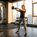 Cast iron kettlebell in various sizes and colours for gym workouts