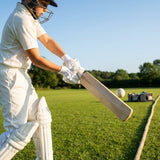Junior cricket batting gloves with leather palm and mesh ventilation