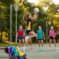 Reversible netball bibs in various colours and sizes for sports teams