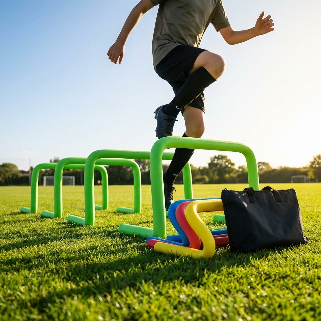 Adjustable foam hurdles in red, yellow, green, and blue for young athletes