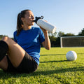 Hygienic water bottle with contactless nozzle for sports use