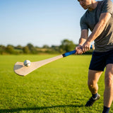 Ash Hurling Stick with custom grip colours, ideal for indoor and outdoor sports