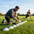 Set of vibrant football training cones in various sizes and colours