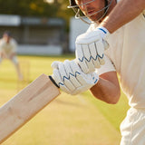 Cricket batting gloves made from premium PU leather for county-level use