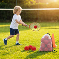 Yellow foam mini tennis balls on a tennis court
