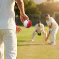 Cricket training ball with reverse swing capability, in red/white and pink/white